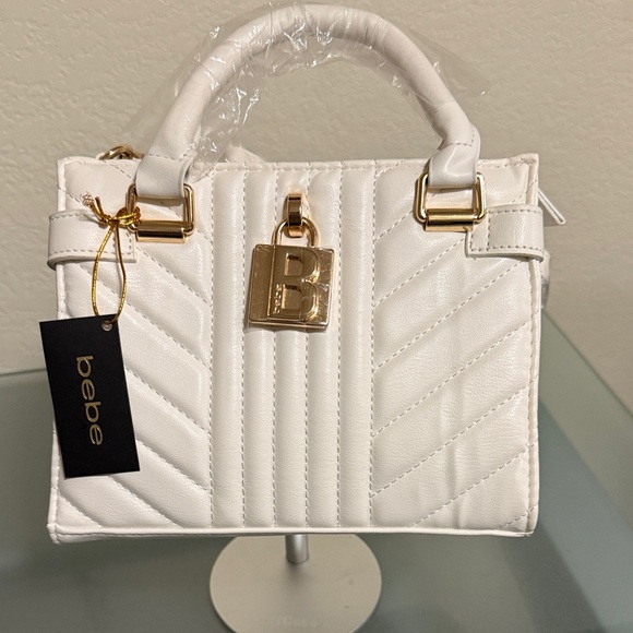 bebe Handbags - Bebe Off White Aerin Small Satchel with Gold Accents